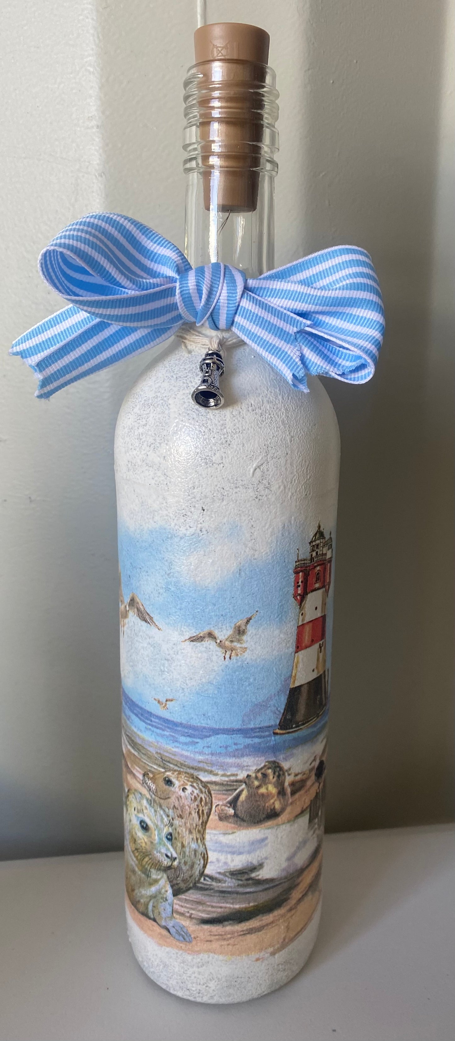 Seal and lighthouse light up bottle