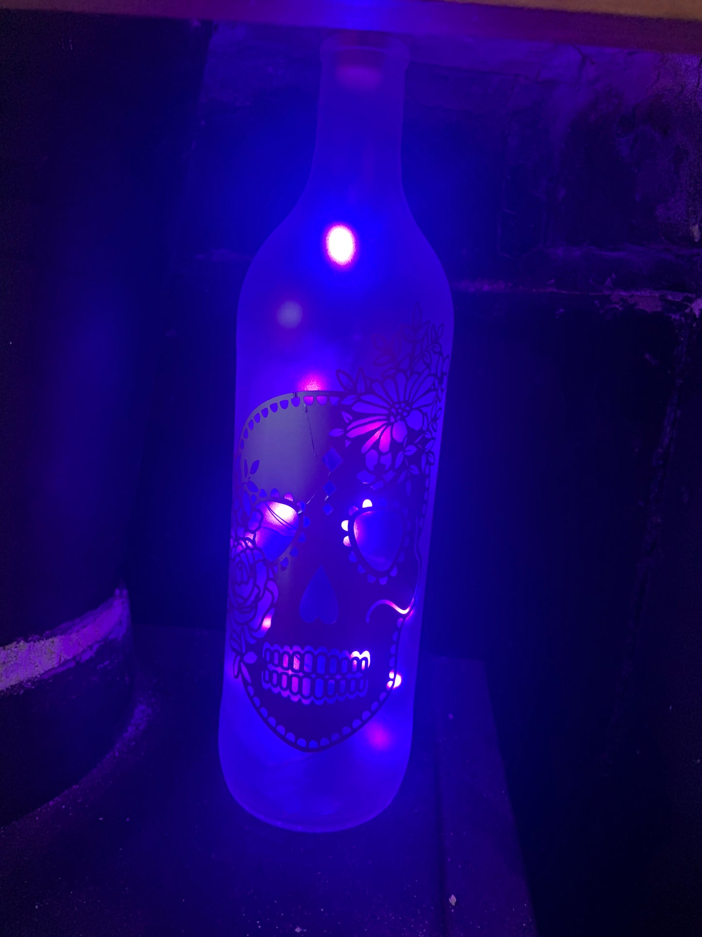 Glittered light up skull bottle