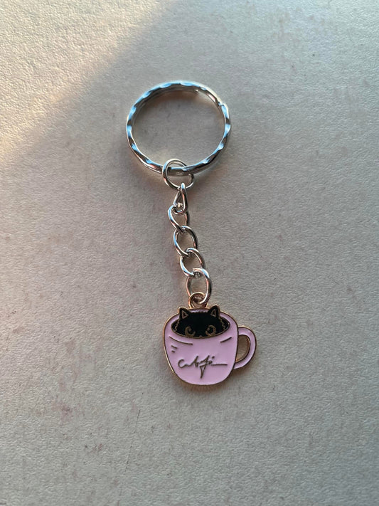 Pink cat in teacup keyring