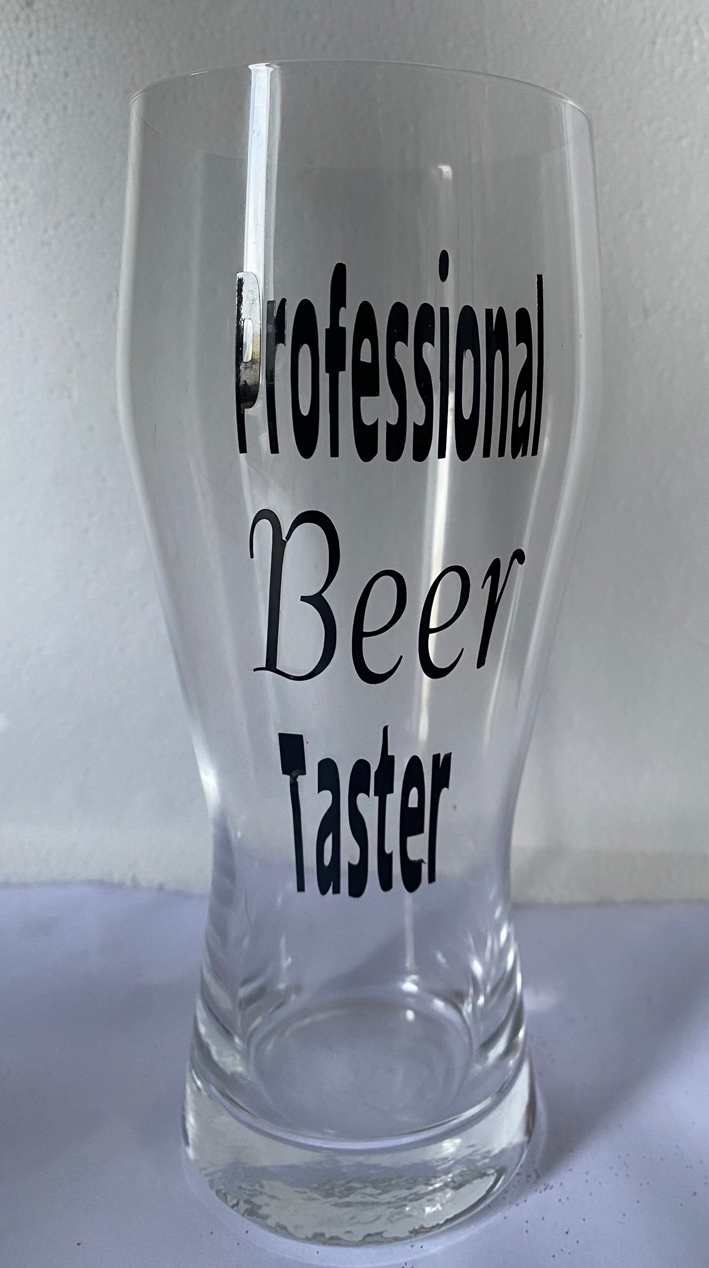 Professional beer drinker pint glass