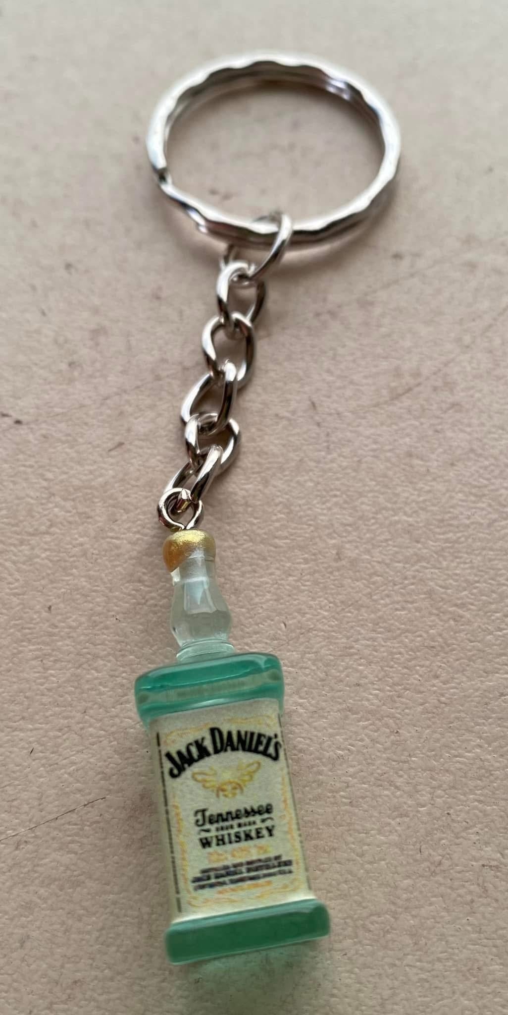 Blue whiskey bottle keyring